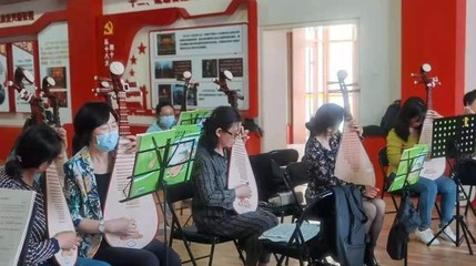 一揉玉弦萬般情，彈支紅曲給黨聽 文化藝術(shù)交流的深情頌歌